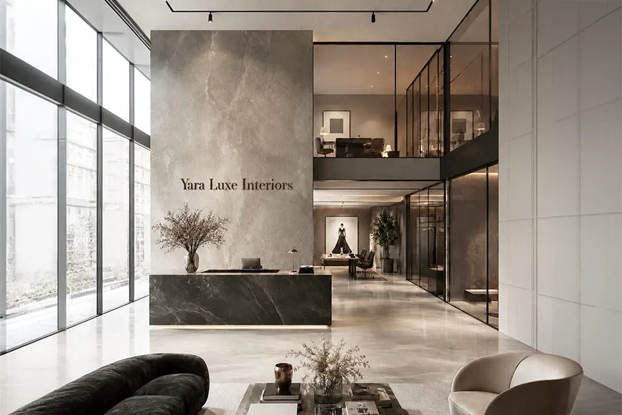 Showroom reception with marble desk, lounge seating and studio branding